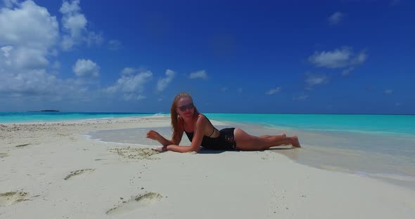 Modern smiling girls on holiday in the sun at the beach on paradise white sand and blue background 4