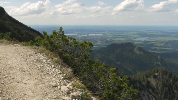 Mountainside foot trail in the Bavarian Alps with a scenic view