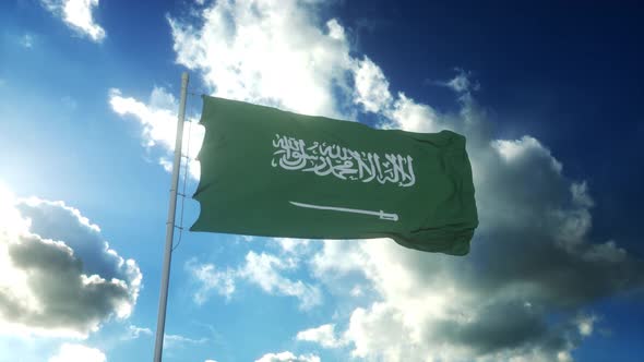 Flag of Saudi Arabia Waving at Wind Against Beautiful Blue Sky