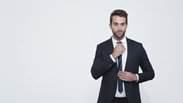 Businessman Adjusting Suit