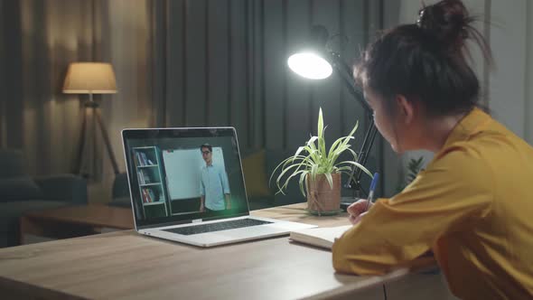 Girl Student Distance Learning With Online Teacher On Computer Screen