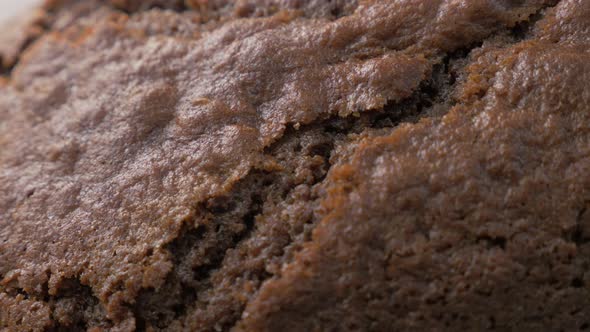 Chocolate cake glazed  and cracked surface close-up 4K 2160p 30fps UltraHD footage - Tasty looking  