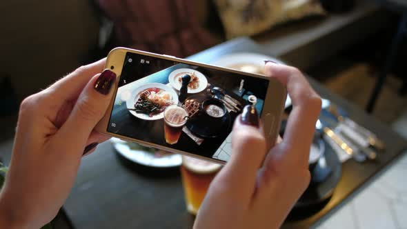 Female Hands Photographing Food By Smartphone