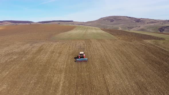 Agricultural Combine Working on the Field