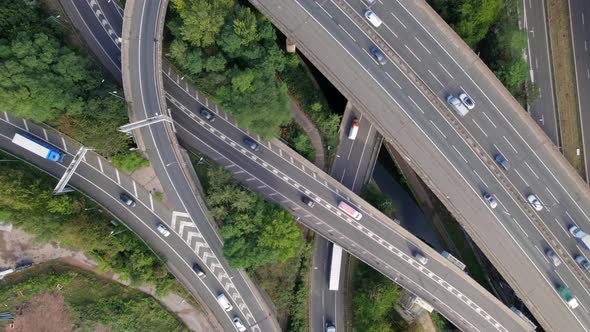 Vehicles Driving Through a Mixing Bowl Interchange Aerial View