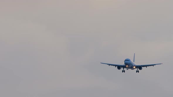 Airplane Approaching Over Ocean