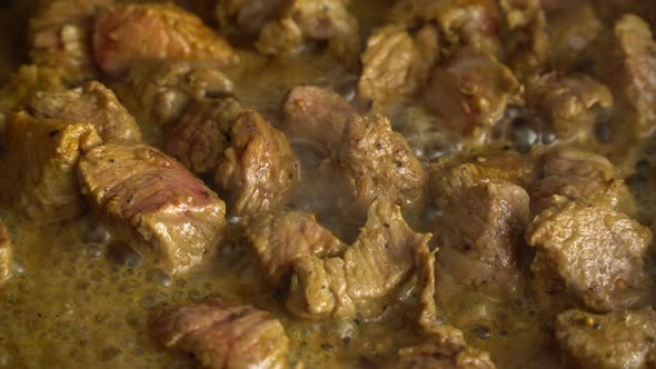 Cooking Meat On A Frying Pan