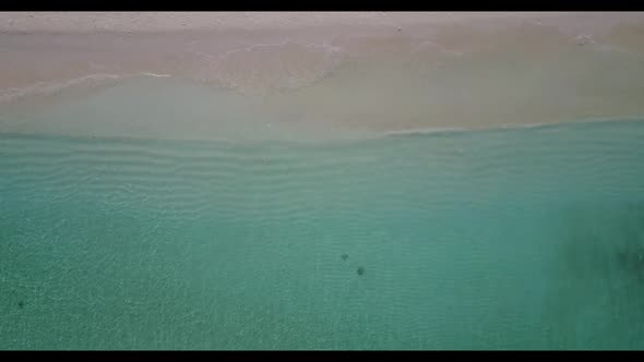 Aerial drone view landscape of marine seashore beach journey by blue green ocean and white sandy bac