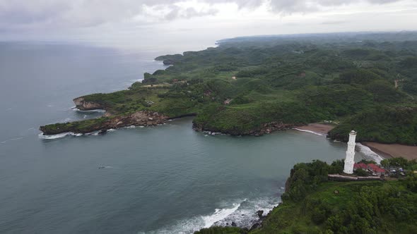 Aerial view of the lighthouse in Indonesian beach