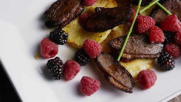 Rotating - smoked duck bacon with grilled pineapple, raspberries, blackberries and honey