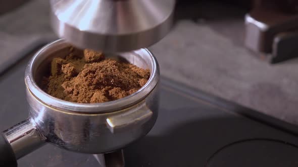 Making Ground Coffee with Tamping Fresh Coffee