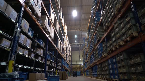 Shelves Full of Product in Large Warehouse Area of ​​Modern Factory 4K