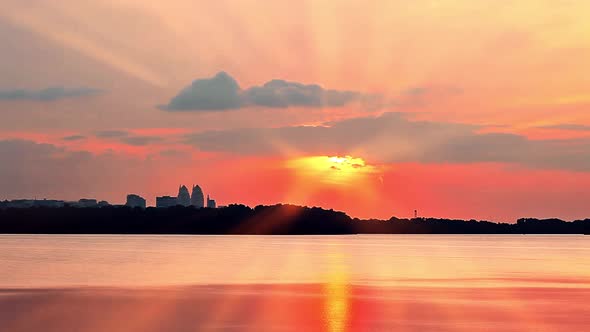 Sunset Over the City. Sun Rays of Sunset.