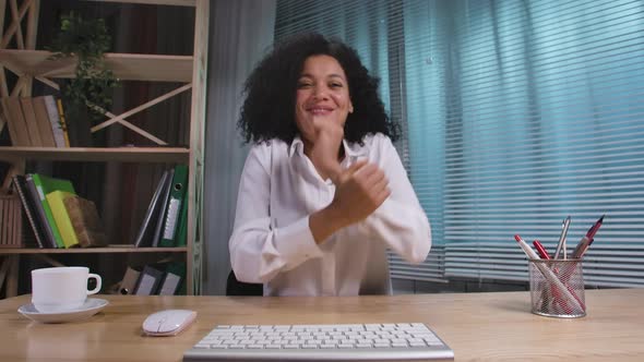 Portrait of African American Woman Typing on Computer Keyboard and Celebrating Victory Received Good