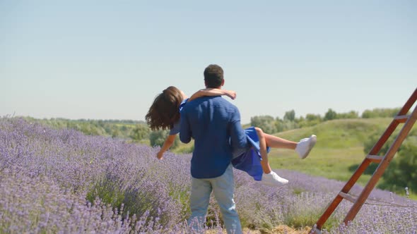 Multiracial Couple Having Fun in Lavender Field