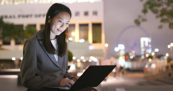 Asian business woman work on notebook computer