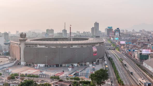 Aerial View of the National Stadium in the Peruvian Capital Lima with Via Expresa Highway Timelapse
