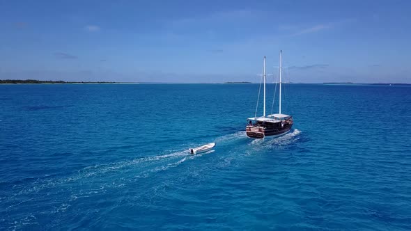 Ship Near Islands of Maldives Drone Parallax Shot
