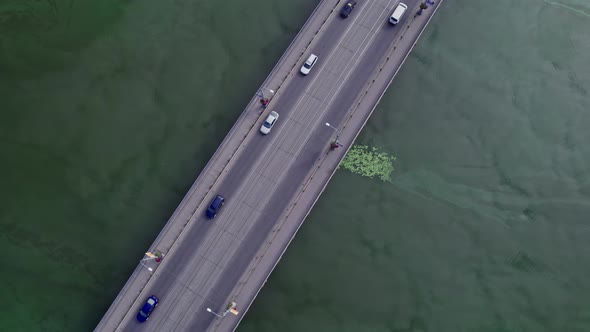 Traffic on the Bridge That Crosses the River