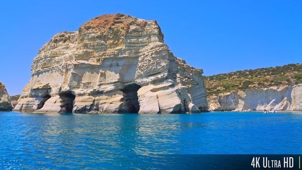 4K White chalk cliffs and coves in Kleftiko bay, Milos, Greece