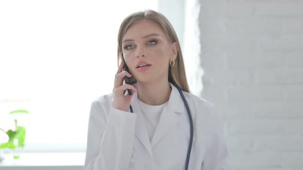 Portrait of Lady Doctor Talking on Phone