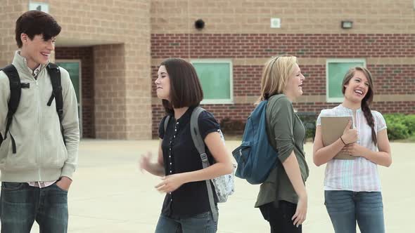 High school students talking together outside