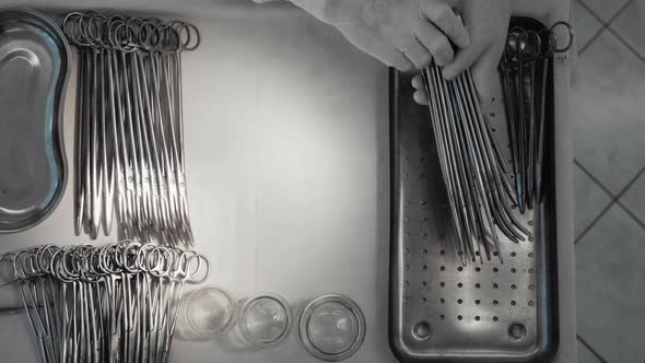 Nurse Preparing Sterile Surgical Instruments Healthcare Worker Prepares Tools