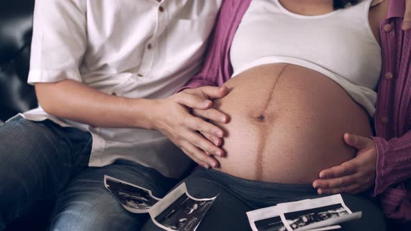 Pregnant Couple Feels Love and Relax at Home