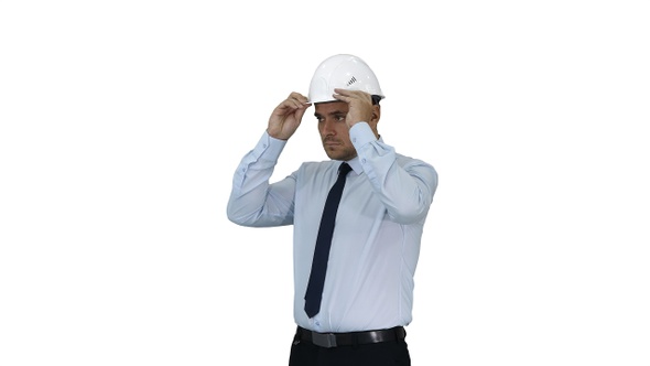 Businessman Putting Hardhat Helmet on Safety on White Background