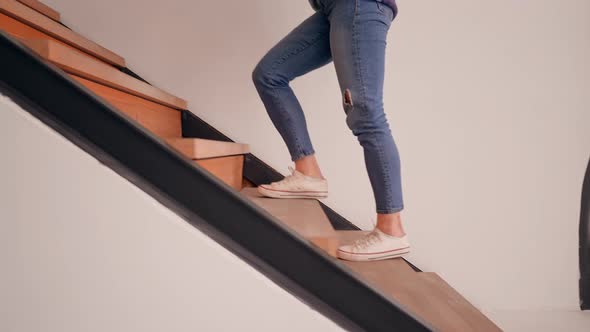 Close Up Details Female Feet Climbing the Stairs