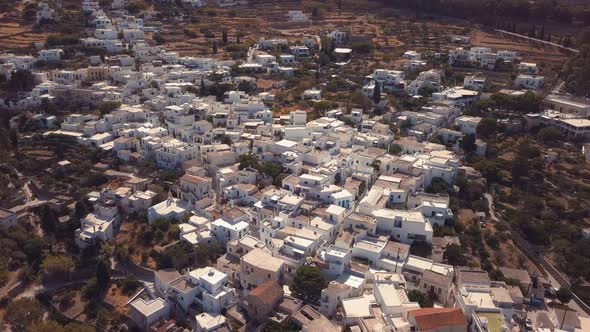 Wide Aerial Drone Establishing Shot of the Agricultural Village of Lefkes Greece