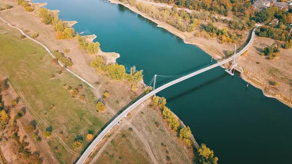 Aerial View Of Herrenkrug Bridge Spanning Elbe River In Magdeburg Germany Drone Pullback (Ascending