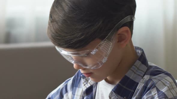 Boy in Protective Glasses Repairing HDD, Young and Curious IT Person, Future Job