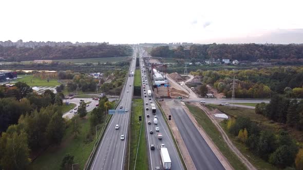 The A1 highway bridge over river Neris in Kaunas, Lithuania in drone aerial flying forwad shot. Heav