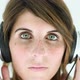 Teenage girl wearing headphones and listening to music - VideoHive Item for Sale