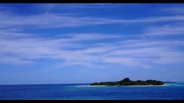 Aerial drone abstract of tranquil seashore beach break by blue ocean and white sand background of a 