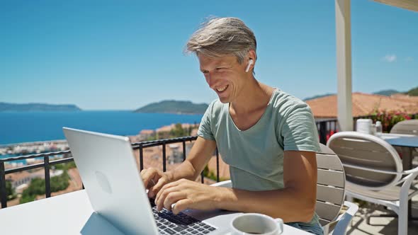 Portrait Adult Grayhaired Man Using Laptop Computer Typing Emails Sending Messages Enjoying Working