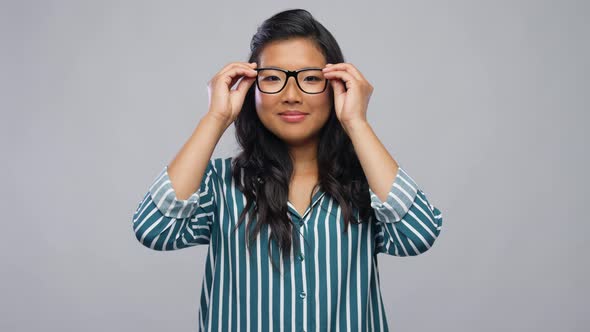 Happy Asian Woman in Glasses or Student