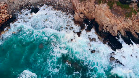 Big Waves Splashing on High Cliffs