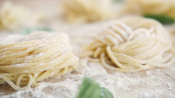 Home Made Pasta on the Table with Flour