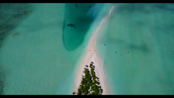 Aerial top view abstract of idyllic resort beach holiday by blue water and bright sandy background o