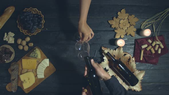 Red Wine on Exotic black Table.