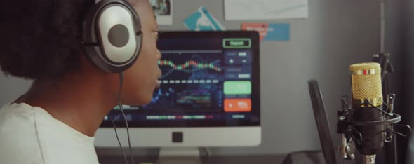 Young Black Woman Recording Business Podcast in Home Studio