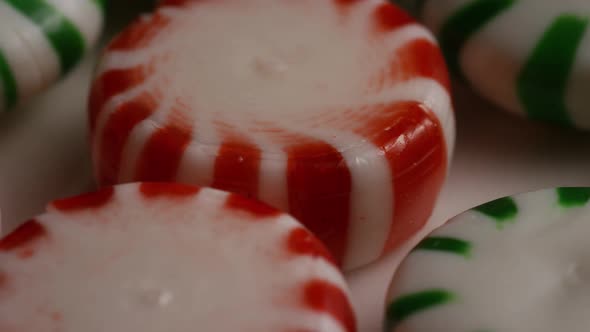 Rotating shot of spearmint hard candies - CANDY SPEARMINT 068