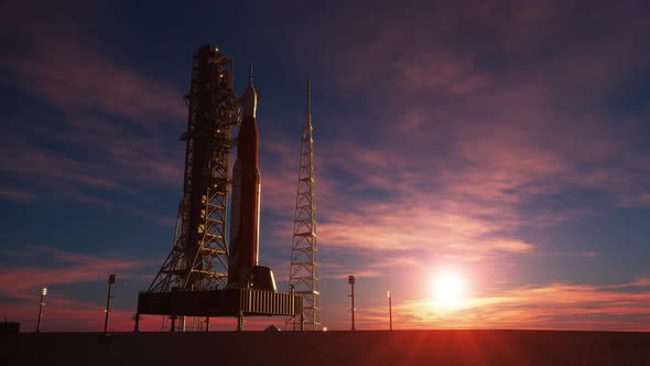 Big heavy rocket on the background of the rising sun alt