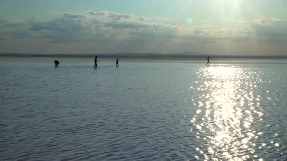 Happy Kids Are  Joking On The Salt Lake 2