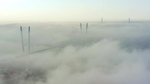 Golden Bridge and Russian Bridge at Dawn Mist in Vladivostok City