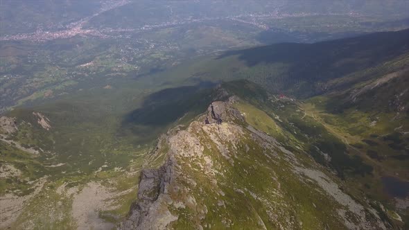 Aerial wide shot of the mountain ridge of Pietrosu Rodnei, Rodnei Mountains National Park, Romania