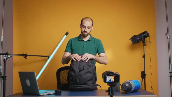 Protographer Presenting Gear Backpack