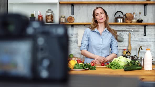 Joyful Modern Girl Shooting Culinary Show Speaking About Ingredient